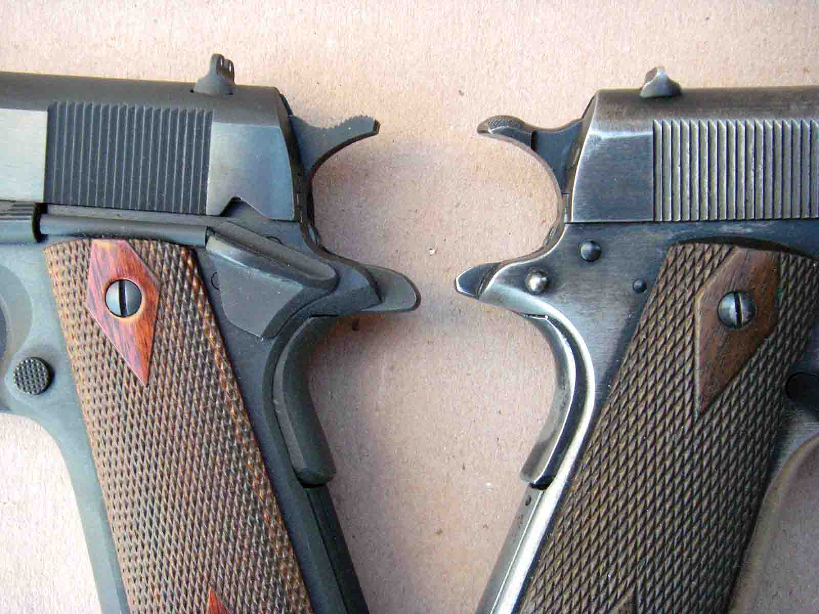 The current pistol’s grip safety (left) is not a high-position pattern, but it helps prevent pinching of the web of the hand.